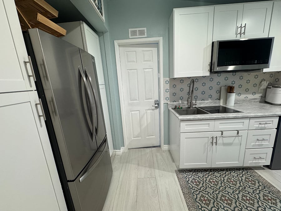 This is the view from your bathroom to the Other Renters Master Suite which they have the Larger suite and combo locks as well.. Tons of privacy!