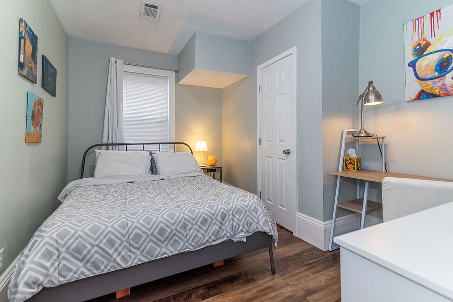 Bedroom 1 with Comfortable Queen size bed.  Black-out curtains.  Working desk. 