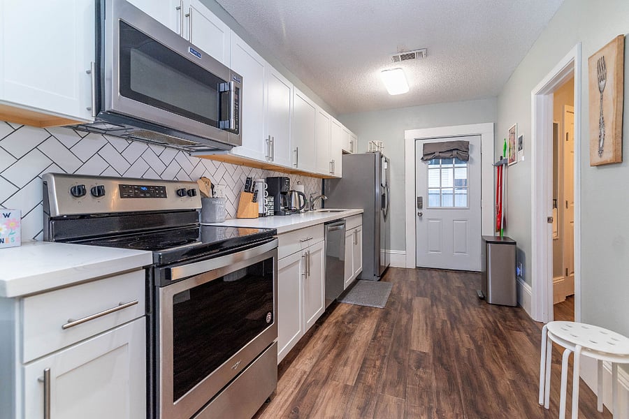 Full size refrigerator and freezer with automatic ice machine. 
