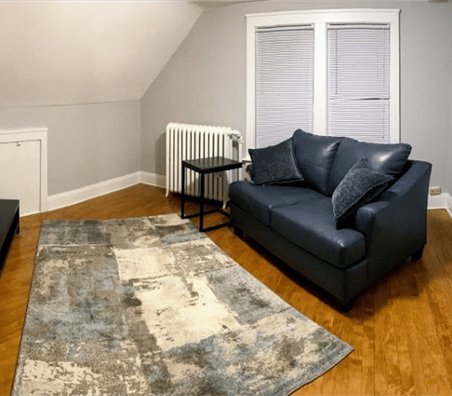 Living Room - View looking inward.

Brand new leather couch!