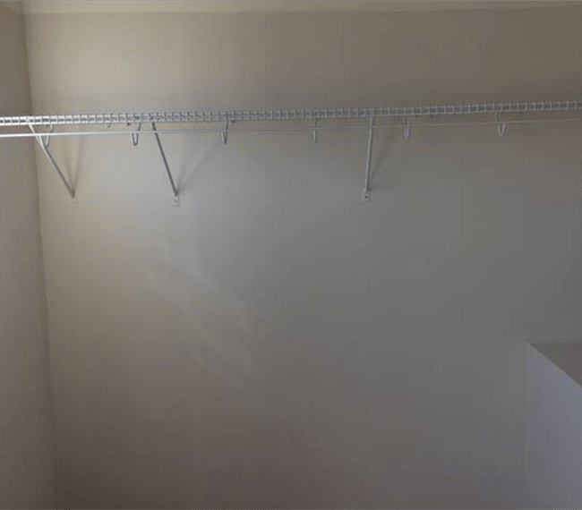 Walk-in closet for 2nd bedroom. 