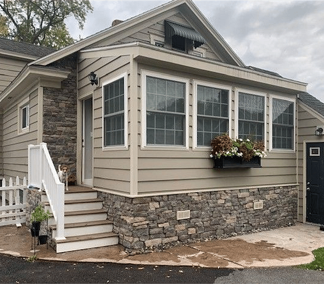 This is the back of the house and the black door to the right is the tenant entrance.