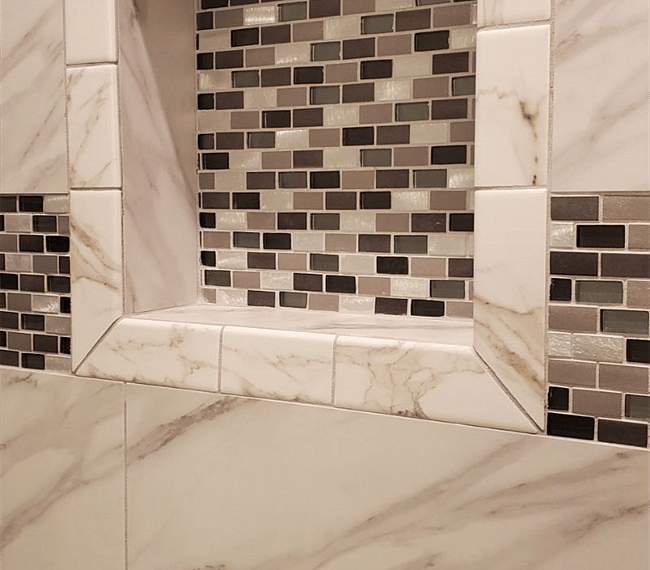 Space inside the shower for bathroom amenities
