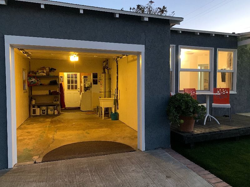 Small garage, can snugly fit our Toyota Highlander.