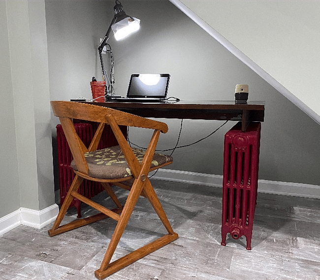I work here every day and it's wonderful. Fun and practical. The radiator bases came out of other parts of the house.