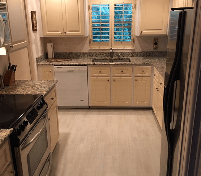 View into kitchen from living room.
