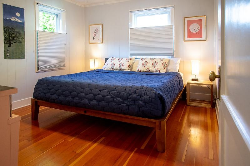 Downstairs Master bedroom features a King bed with with brand new Tuft and Needle Mint mattress and Thuma solid wood frame. Bedding by Crate and Barrel and Pottery Barn. Touch bedside lamps have 3 way bulbs and USB ports built in.
