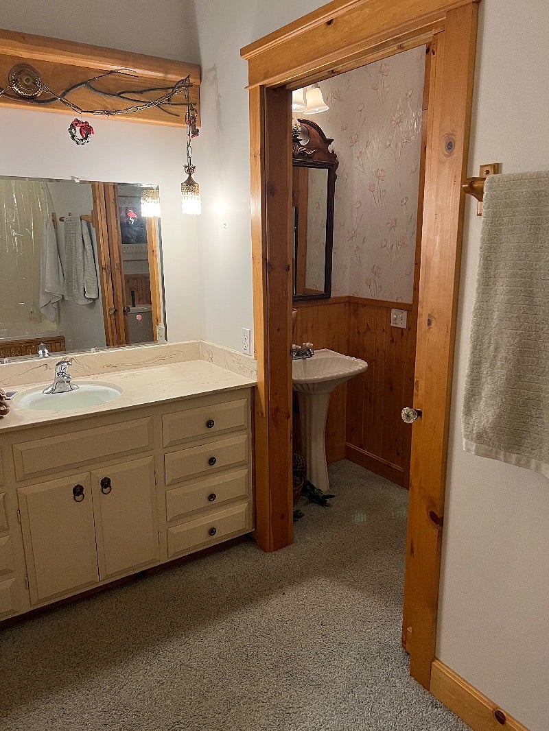 Dressing room with spa tub and shower
