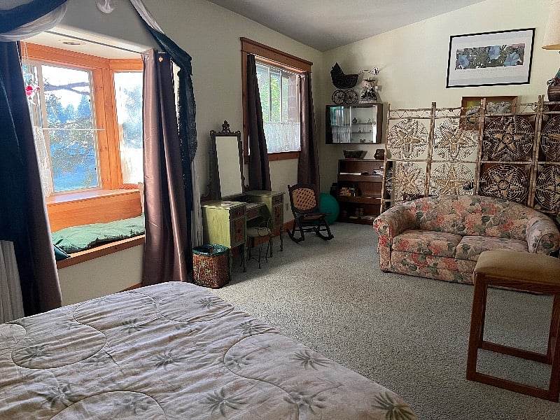 Primary bedroom with window seat and office space - Blackout curtains for sleeping in