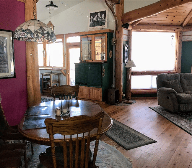 Dining nook open to living room and kitchen - no cabin fever!