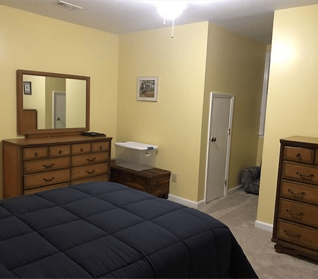 Upstairs bedroom # 1 (alternate view) with a storage cubby in view. 