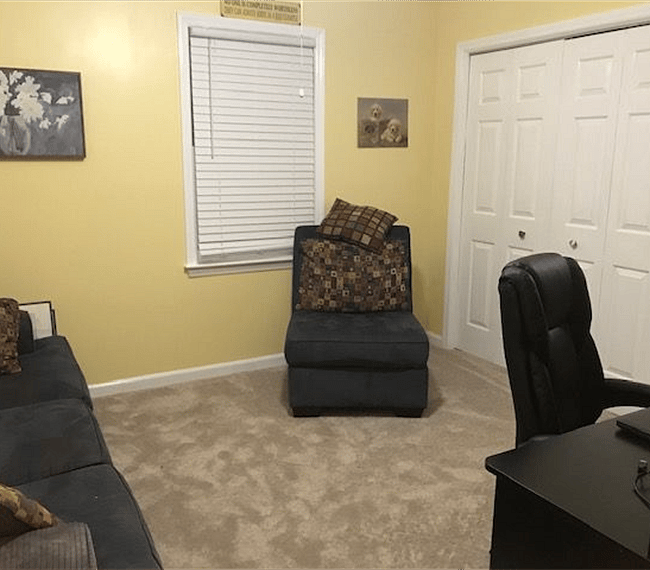 Upstairs bedroom # 2 - set up as a sitting / TV / office area