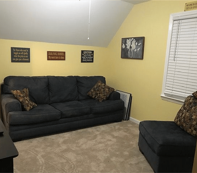 Upstairs bedroom # 2 - set up as office / TV / sitting area
