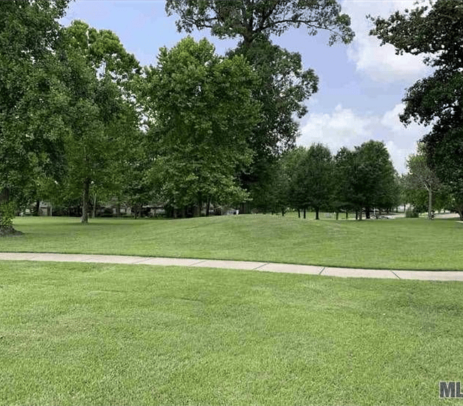 Park adjacent to our complex with walking paths and picnic tables