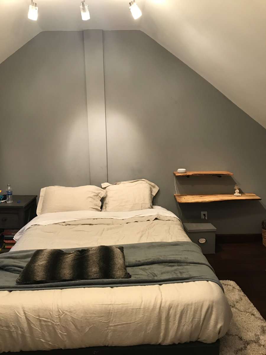 3rd floor bedroom with access to the roof deck