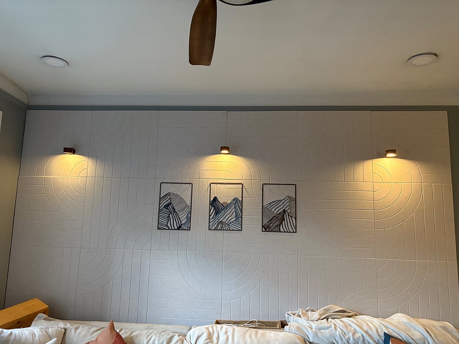 Recently added sound-dampening panels and accent lighting in the living space.