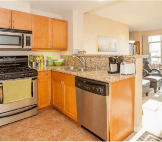 Kitchen facing west to dining area