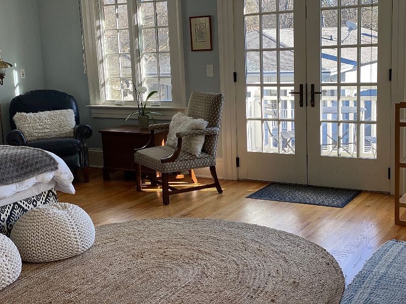 French doors leading to private balcony.