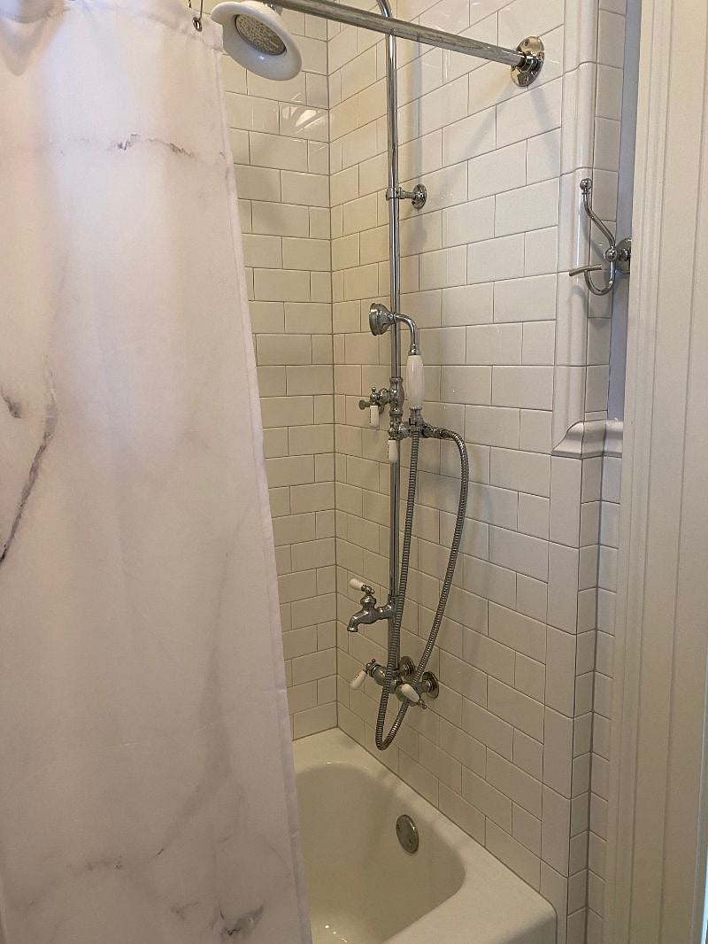 Shower/tub combo.
