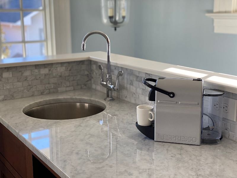 Kitchenette with Nespresso machine.