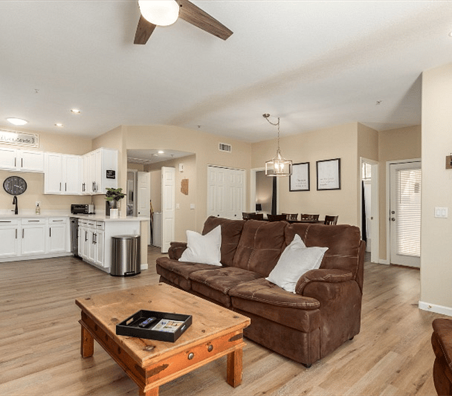 Open seating with proximity to kitchen and dining area for 6