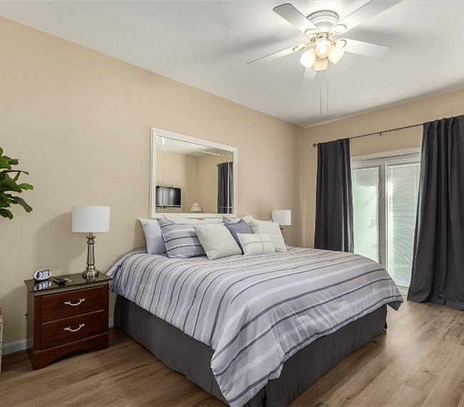 Master bedroom is extra large with outside private patio and room darkening panels