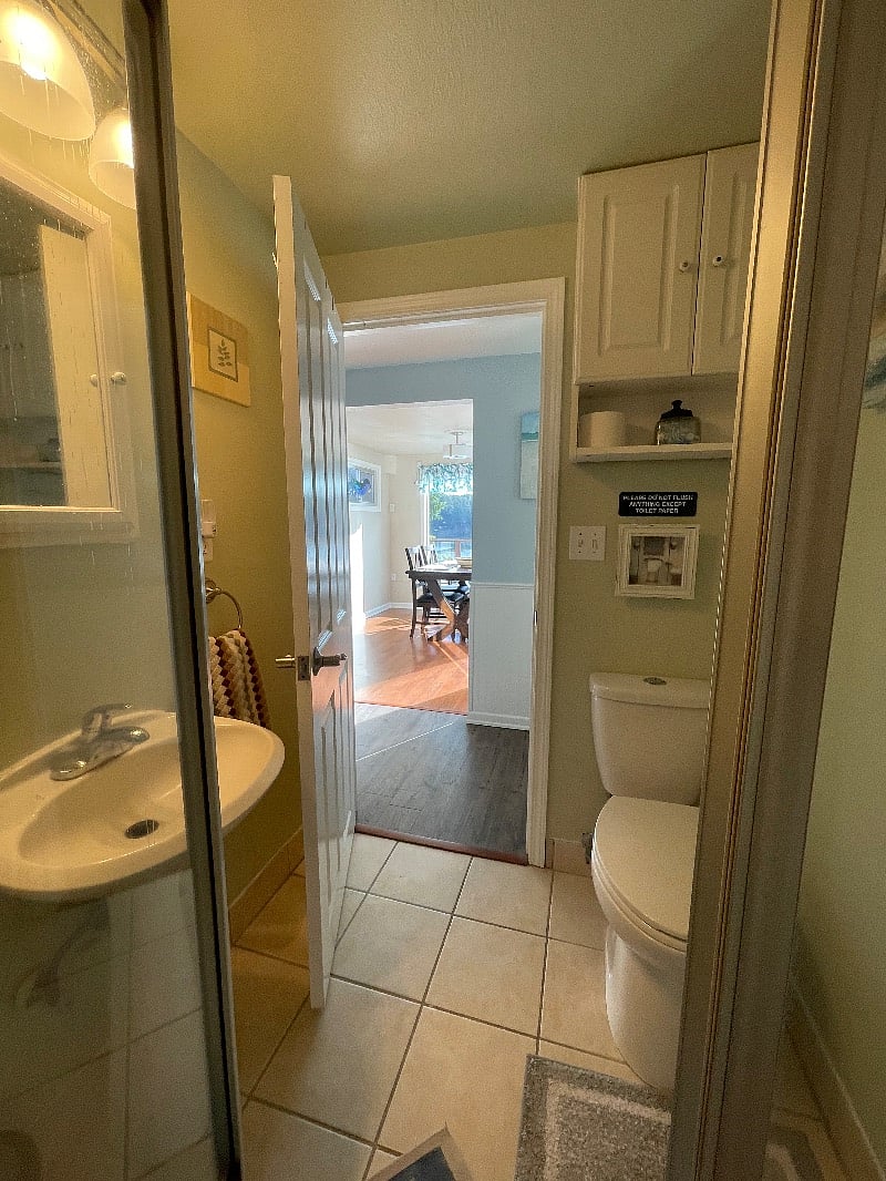 View from shower through dining room to the water