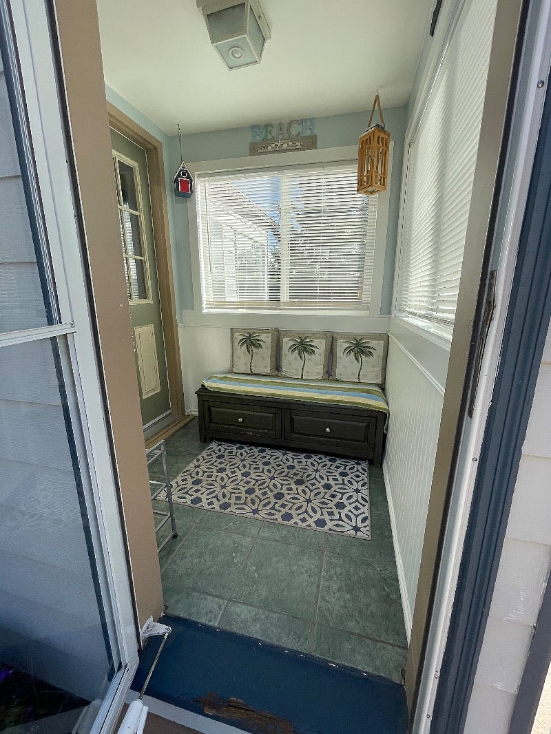 Mudroom entrance with sitting nook with storage drawers