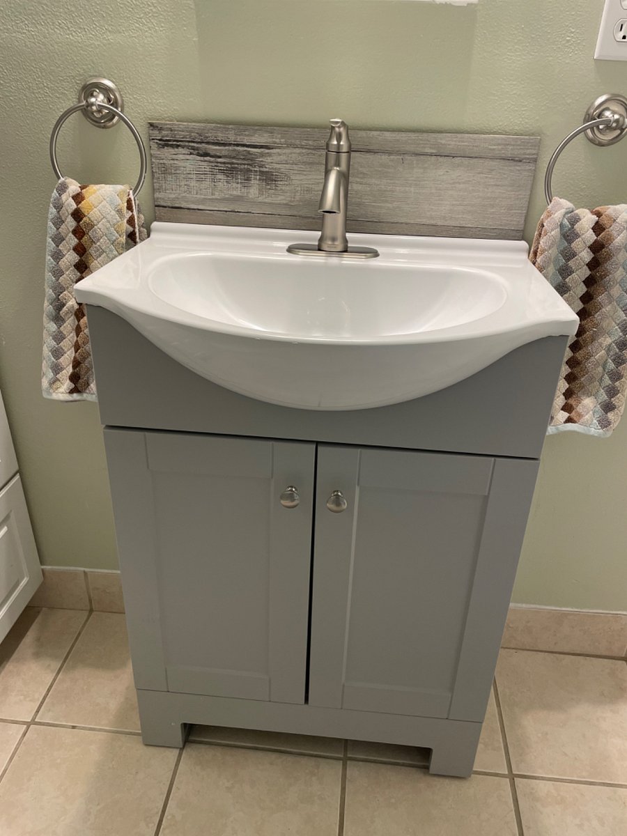 New pedestal sink with cabinets