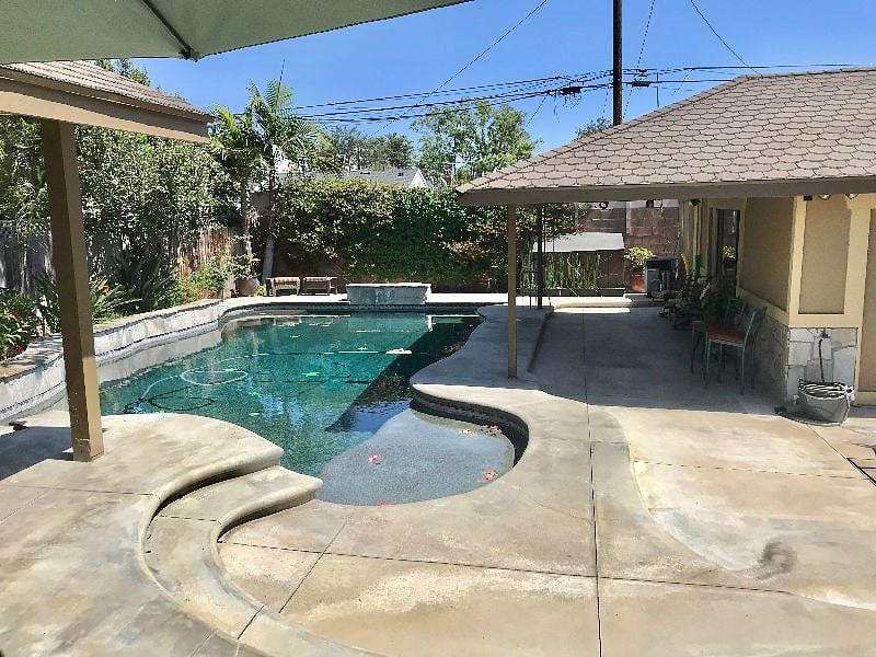Backyard oasis, laundry is in the outside converted garage to the right in this photo