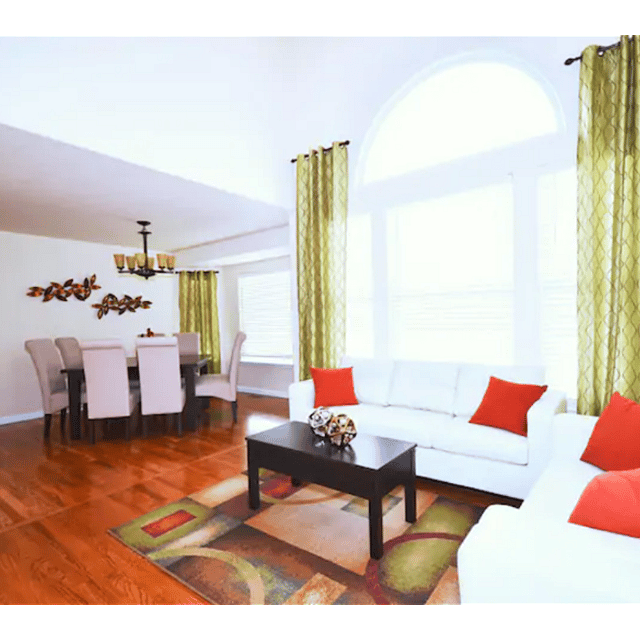 Shared Space: Open concept living room and dining room. Vaulted Ceilings