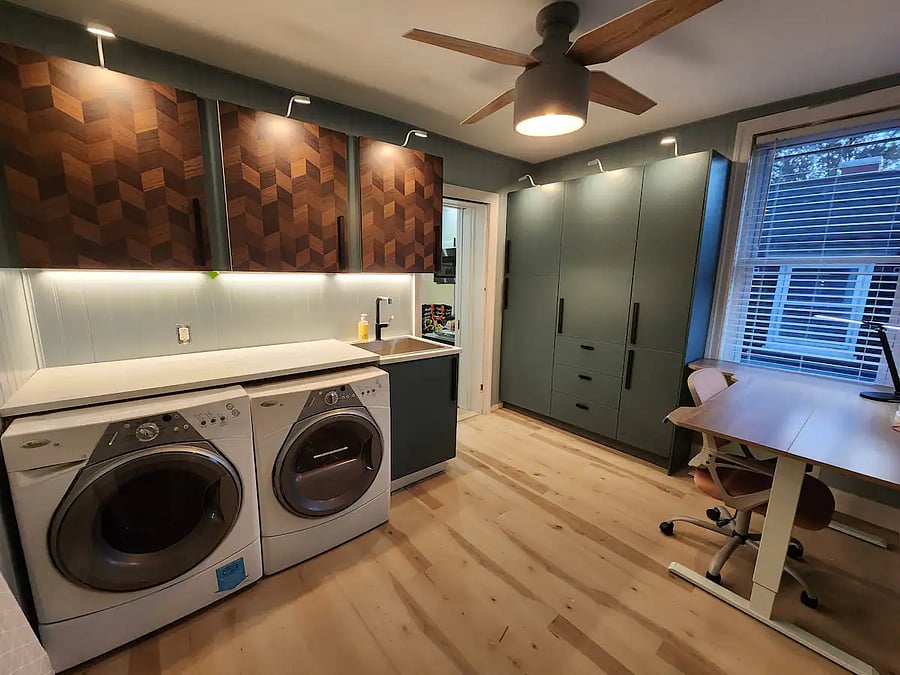 Gorgeous new laundry/mudroom, with deep utility sink, front load washer and dryer with large countertop, tons of cabinet storage including food pantry.