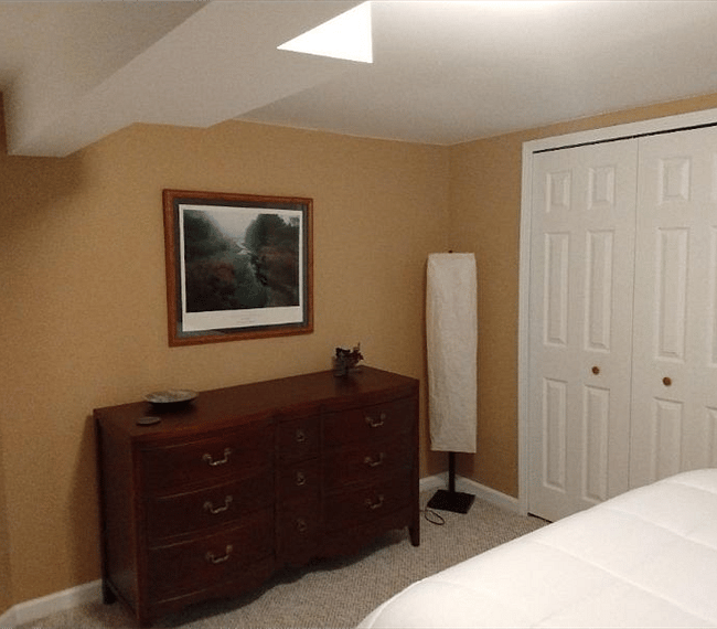 Bedroom 2 - Personally re-furbed, antique furniture...so amazing. This is a downstairs bedroom.