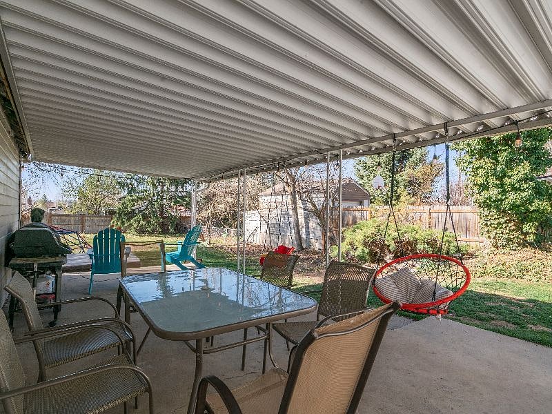 Quarter acre property with large backyard for entertaining. Includes hot tub, BBQ, and outdoor dining.