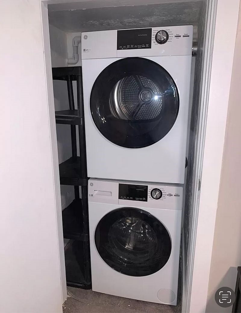 Washer and dryer, in the closet next to the TV in the living room