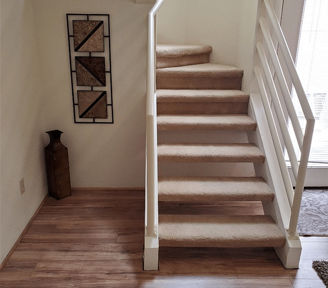 Stairs to 2nd floor bedroom and bathroom.