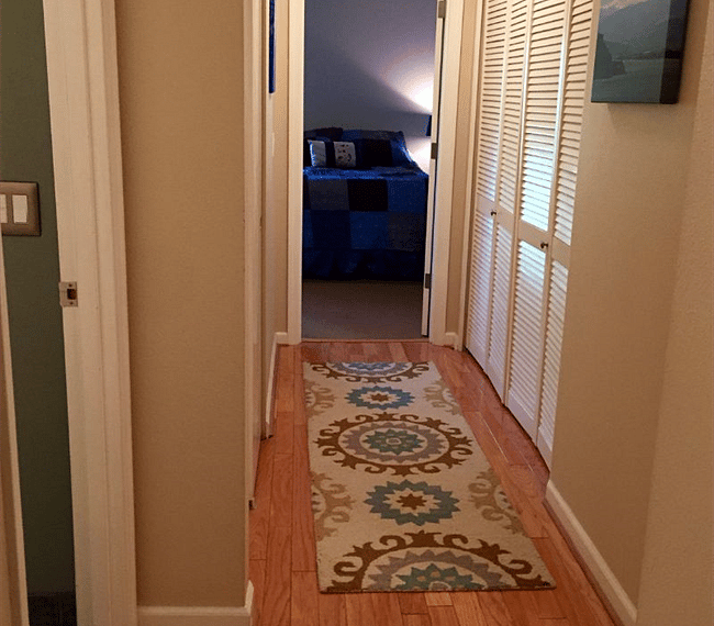 Hallway to master bedroom. View from second bedroom/office.