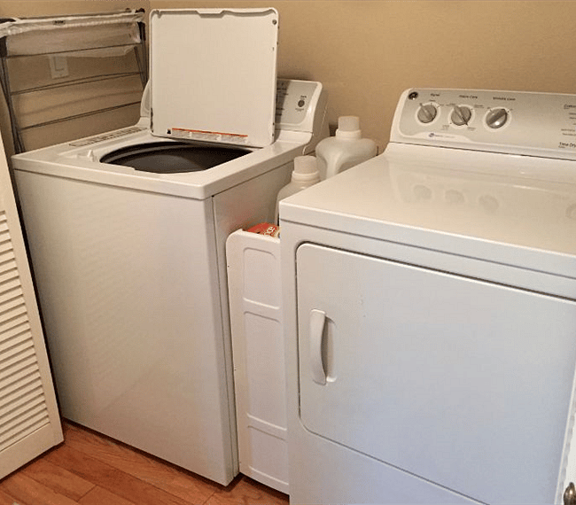 Laundry in the hallway. Full-size washer and dryer.