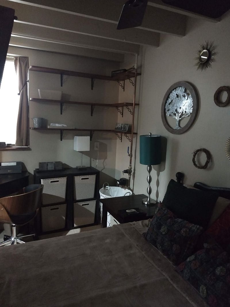Bedroom with Full Size Bed, lamps, desk, window, etc.