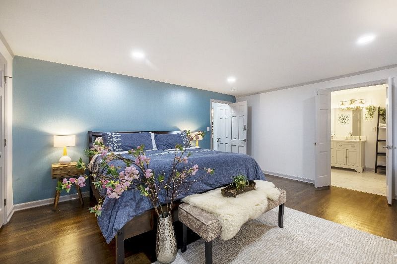 Upstairs master bedroom with a private ensuite  comfort and privacy combined.