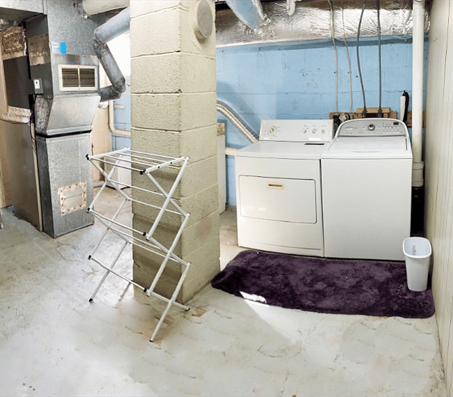 Your own laundry room right next to the bedroom