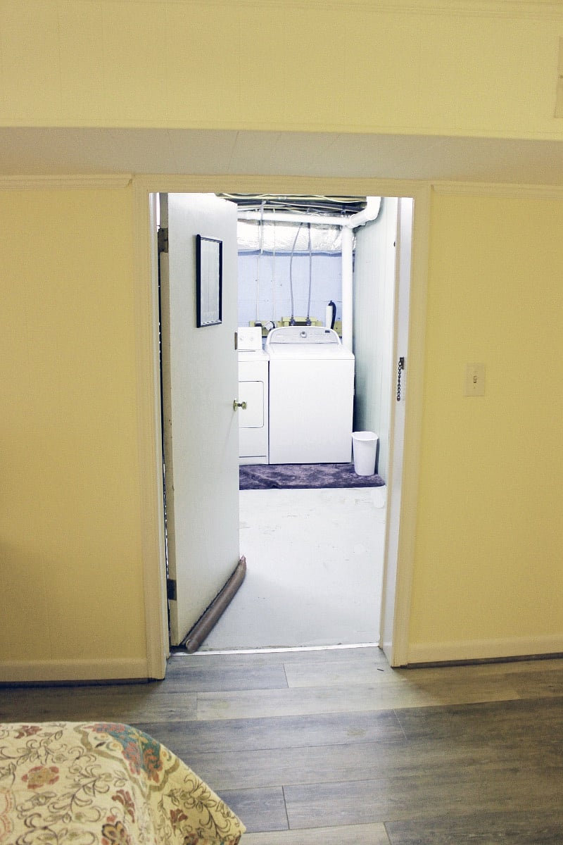 The laundry room is adjacent to the bedroom