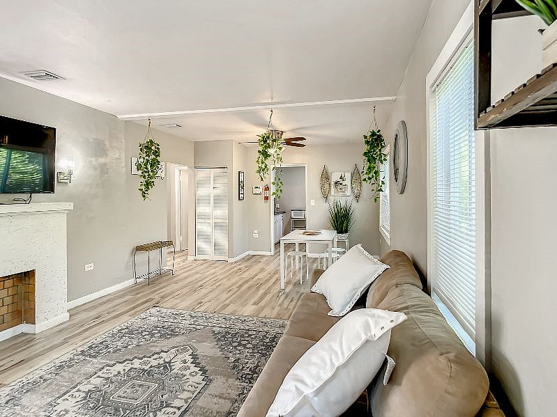 The living room has a full view of the dining area so you can eat and be entertained simultaneously.
