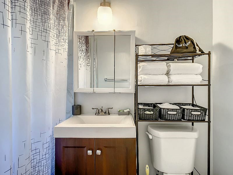 In addition to linens, you'll also be provided a hair dryer and a few first aid items.