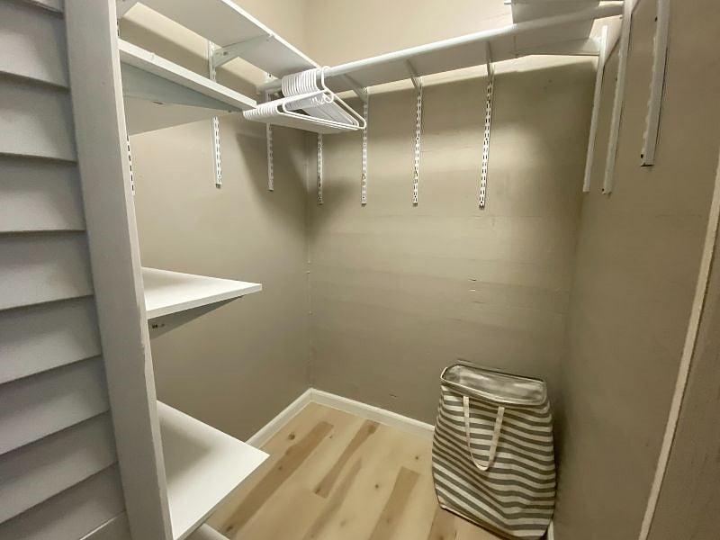 Within the room is a full size walk-in closet (separate from the linen closet) for plenty of space for personals!