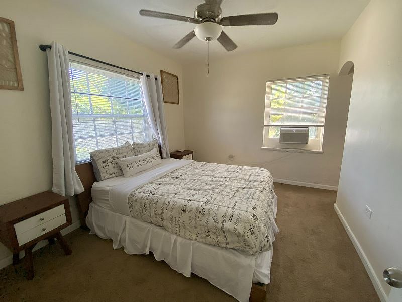 From your living room, you can walk right into your room fully furnished with a queen size bed, linen closet, and two night stands.