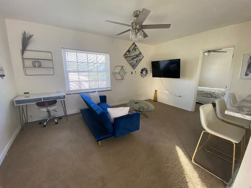 Step out of the kitchen and into the entertainment space. Let's take a look at each part of this room.