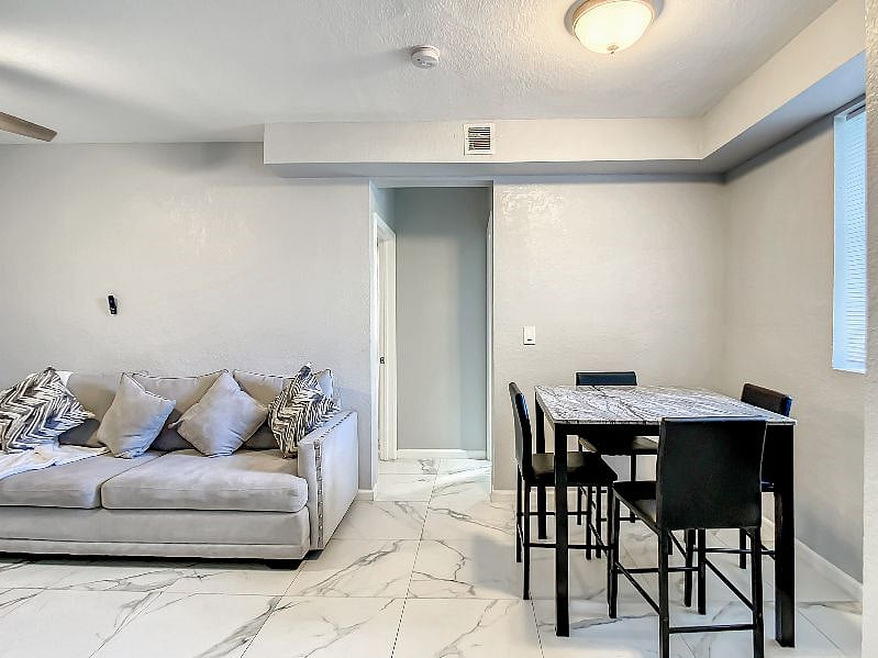 The eating area is compact and modern, providing everything you need with no unwanted clutter!