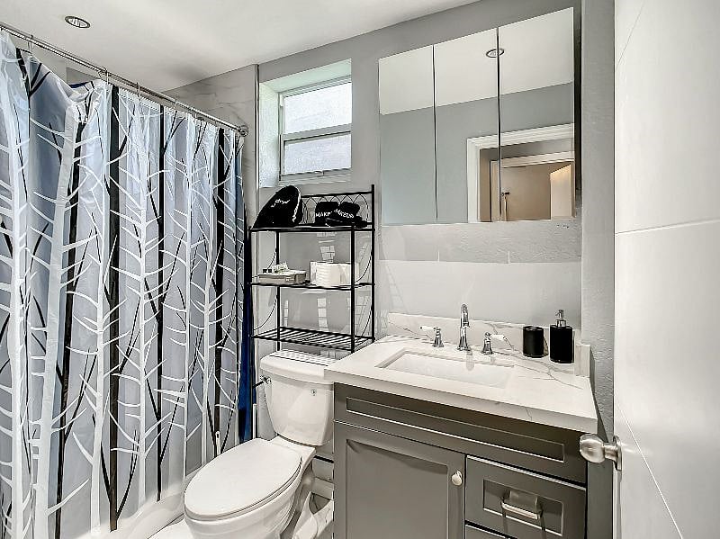 Finally, we step into the apartment's only bathroom, which is a luxurious show stopper. You will be provided starter toiletries, a hair dryer, starter first aid supplies, and towels, if requested.