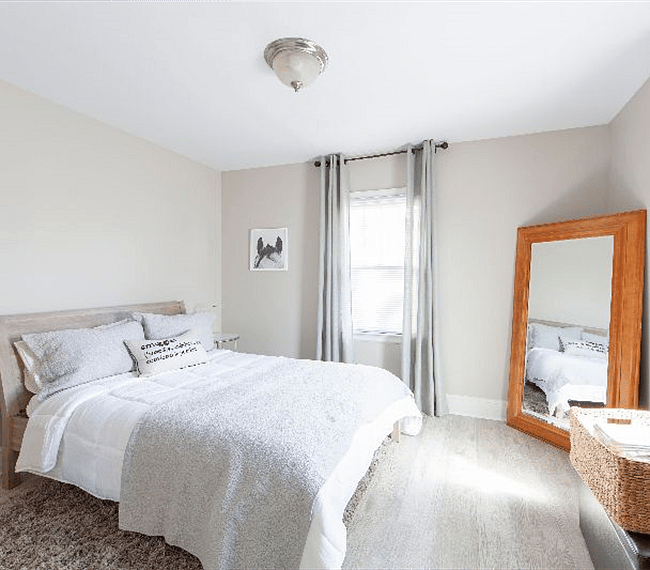 Bedroom 1 with comfortable queen bed and plenty of closet space.